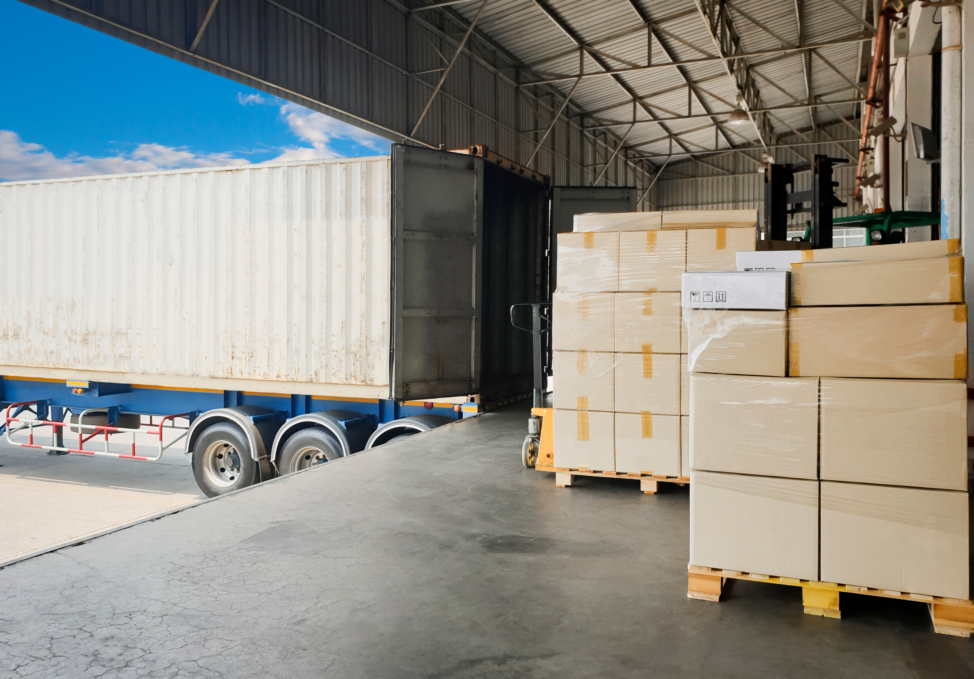 Stacked package boxes loaded inside a distribution warehouse